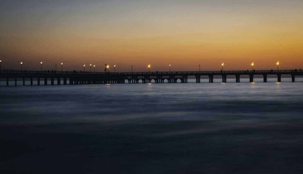 sunset bridge sea lithuania 4138812